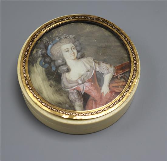 A 19th century ivory box, the lid painted with a lady, with tortoiseshell interior.
